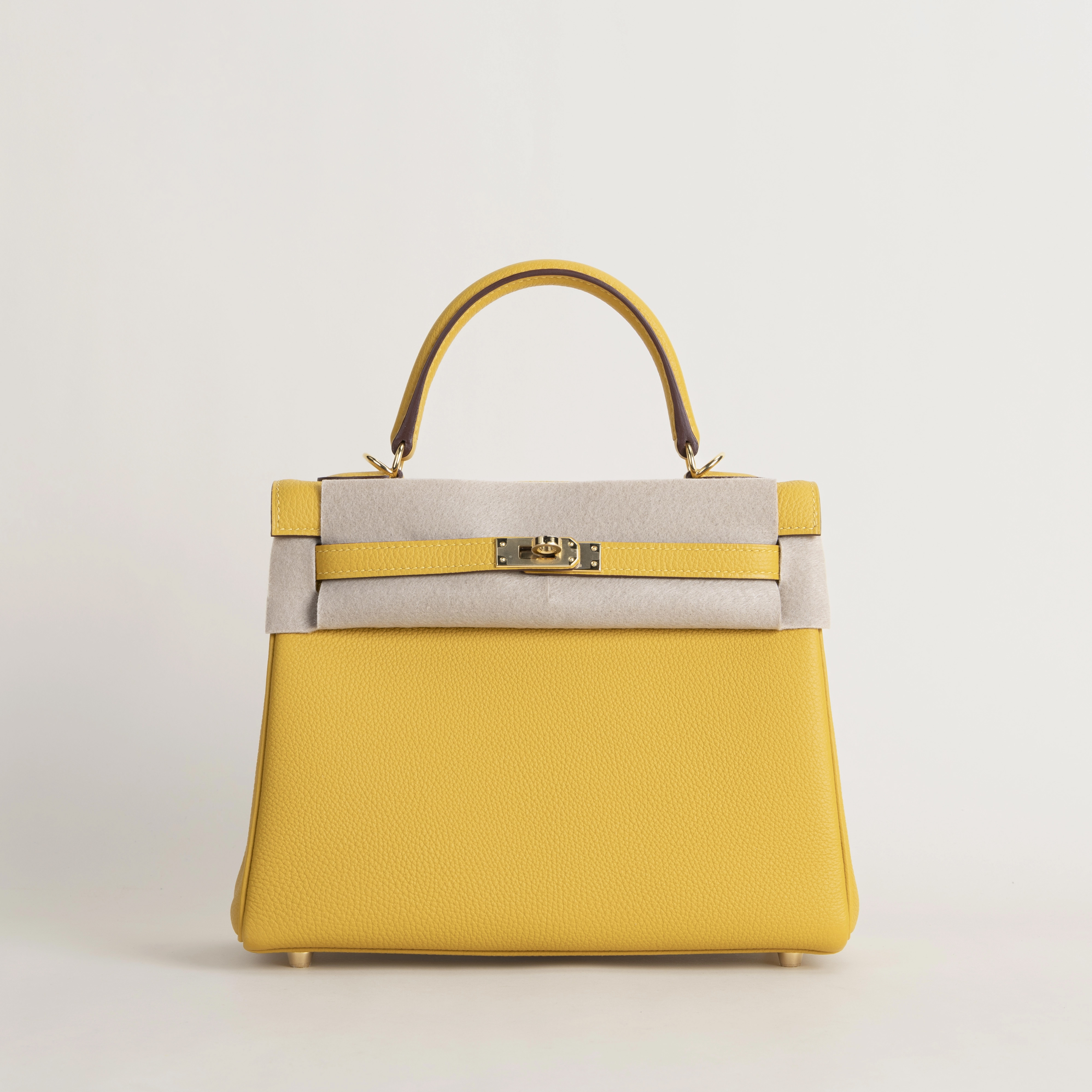 Kelly25 Togo 9D Jaune amber GHW