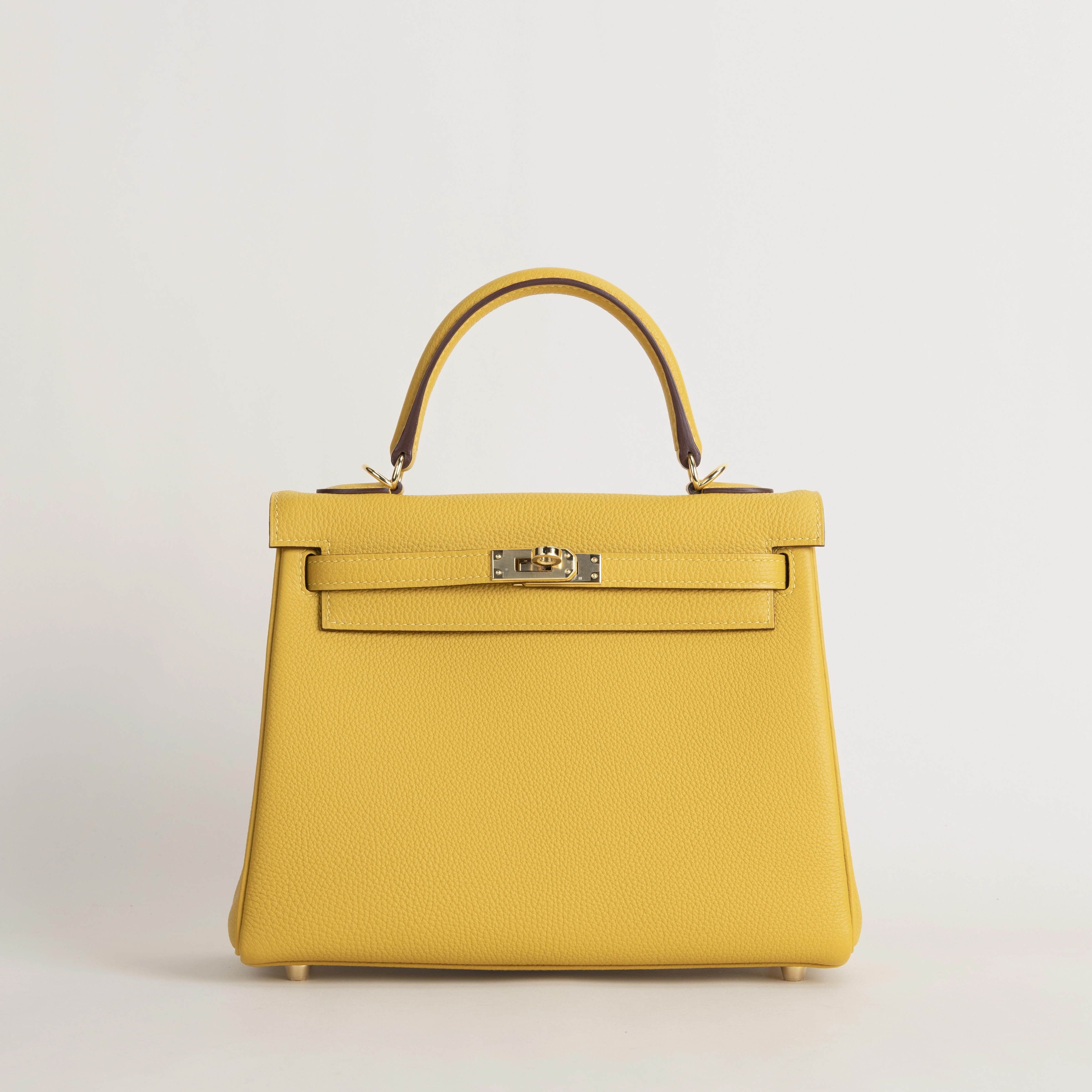 Kelly25 Togo 9D Jaune amber GHW