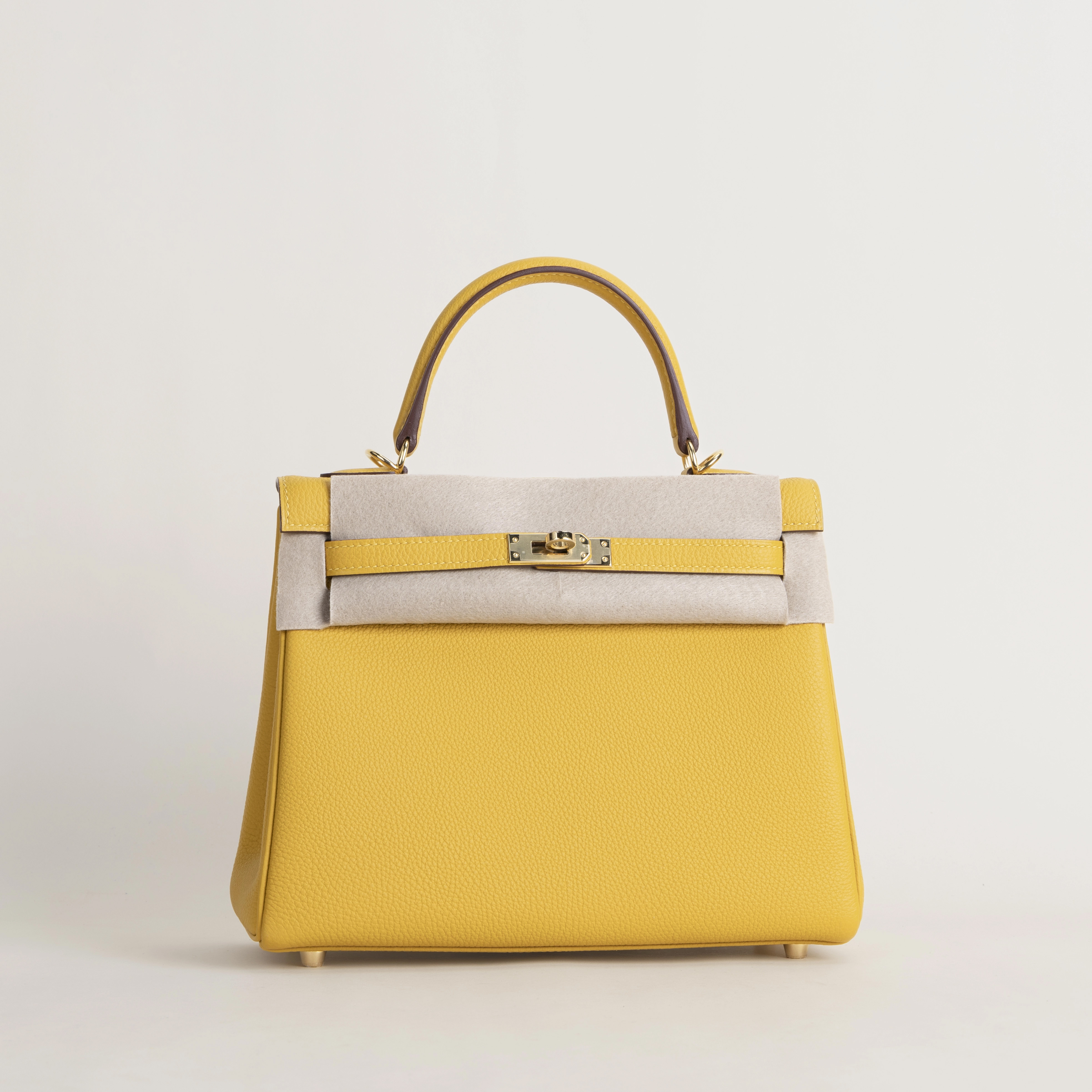 Kelly25 Togo 9D Jaune amber GHW